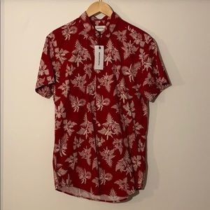 Brand new button down short sleeve shirt.